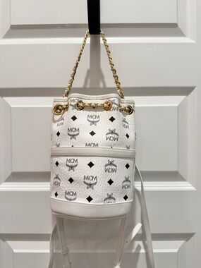 MCM White Logo Drawstring Bucket Backpack with Gold Chain Detail